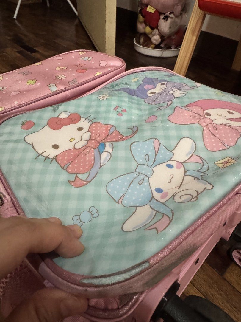 Sanrio school bag and lunch box (Category: Babies & Kids Fashion) located in Quezon City. Submitted by mdrpang (Listing ID 1439615346, Image 3). Description: Still in good condition Working zippers and stroller puller Only flaw: a portion of the corner outside pocket outline peeled off but doesnt affect the functionality of the bag Orig price: 4,200 php.