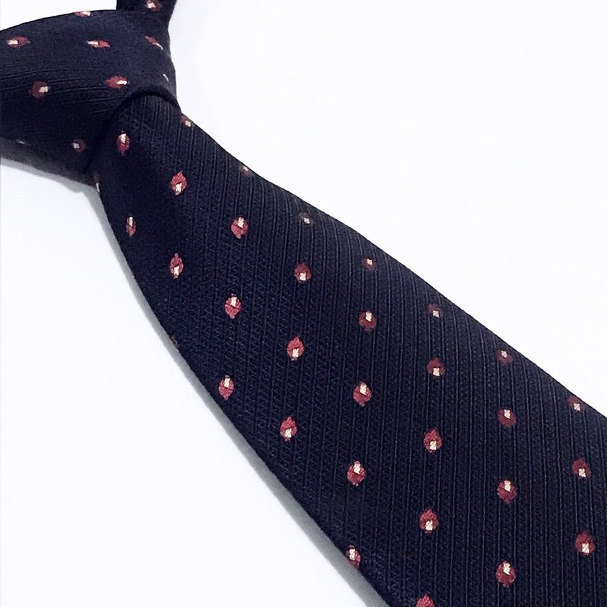 Select Navy Blue Textured Weave Navy Blue Neck Tie (Category: Ties) located in Taguig. Submitted by retrogaze (Listing ID 1439647213, Image 1). Description: This Select necktie features a foundational navy blue base enriched by a dense, textured weave that gives the fabric a fine, tactile dimension. It is decorated with an orderly jacquard repeating micro design pattern composed of miniature, pin-dot geometric floral clusters in a crisp contrasti