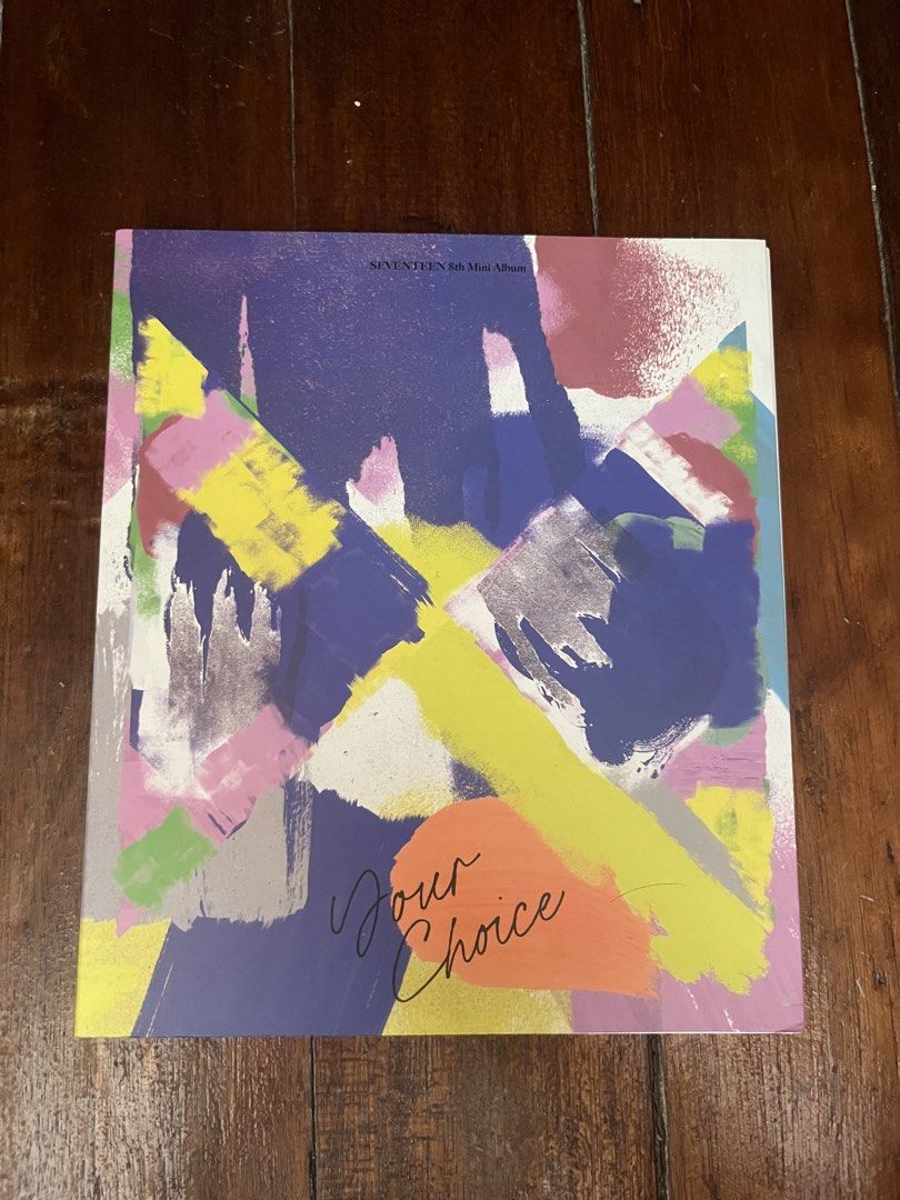 Seventeen 8th Mini Album Your Choice (Category: CDs & DVDs) located in Quezon City. Submitted by atashanini (Listing ID 1439698807, Image 1). Description: - Seventeen 8th Mini Album "Your Choice" - Includes album, CD, and inclusions - Features a colorful abstract album cover - CD is visible - Includes photocard and other items.