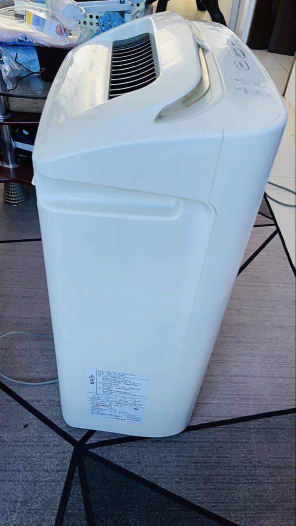 Sharp Air Purifier 7000 (Category: Air Purifiers & Dehumidifiers) located in Quezon City. Submitted by rongonzales02 (Listing ID 1439652091, Image 3). Description: - White Sharp air purifier - Top-mounted control buttons - Rear filter system - Equipped with wheels for mobility - Features the Sharp logo - Model number: 7000 Humidifying Air Purifier KC-Z45-W SHARP JET Rated voltage: 100-110V Rated frequency 50-60Hz Rated power consumption: 43W .