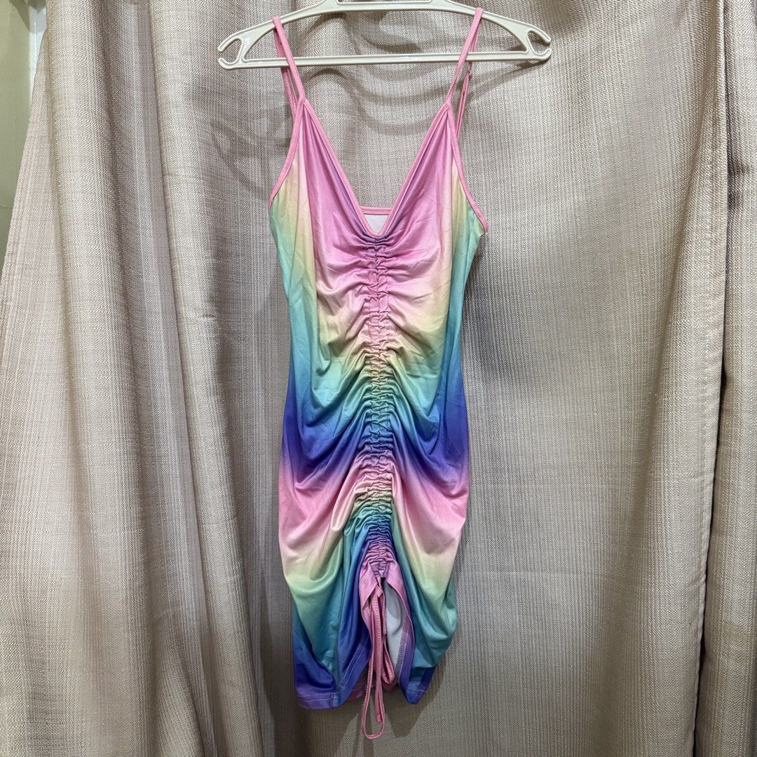 SHEIN Bodycon Rainbow Ruched Mini Dress (Category: Dresses) located in Manila. Submitted by miss.v.declutter (Listing ID 1439769338, Image 1). Description: - Rainbow gradient design - V-neckline - Adjustable spaghetti straps - Ruched center for customizable fit - Adjustable drawstring hem - Fits body very nicely!.