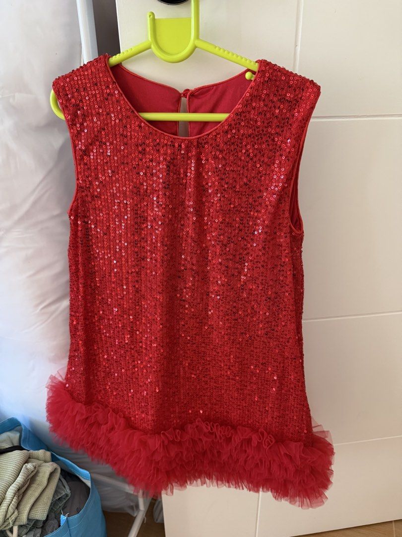 Shein kids Red Sequin dress (Category: Babies & Kids Fashion) located in Iloilo. Submitted by papillon30 (Listing ID 1439624161, Image 1). Description: - Red sequin sleeveless top - Features a playful ruffle trim - Round neckline - Keyhole back detail - Ideal for festive occasions and parties Fits 6-8.