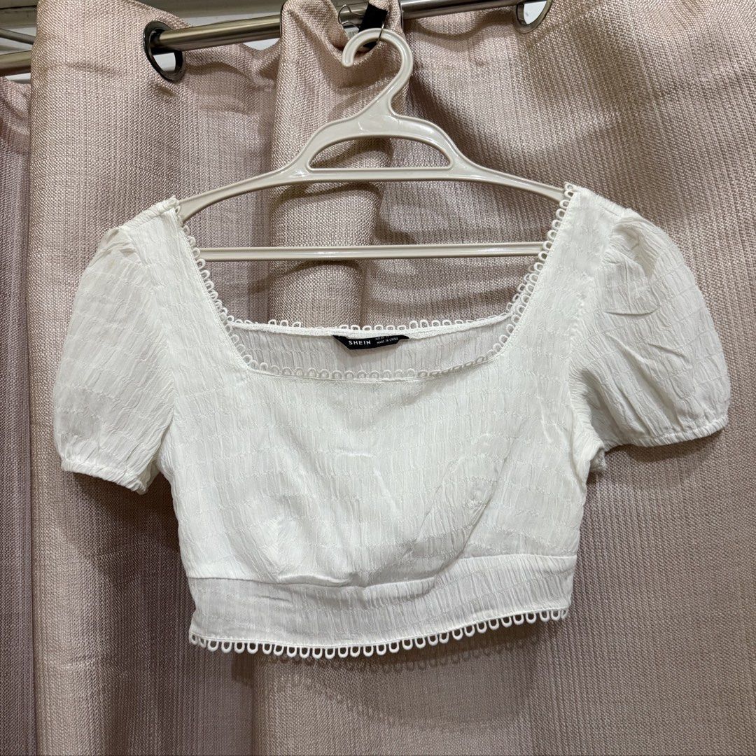 Shein White Crop Top (Category: Sleeveless) located in Manila. Submitted by miss.v.declutter (Listing ID 1439771291, Image 1). Description: - Shein white crop top - Square neckline with lace trim - Zipper closure on left side - Fitted waist.