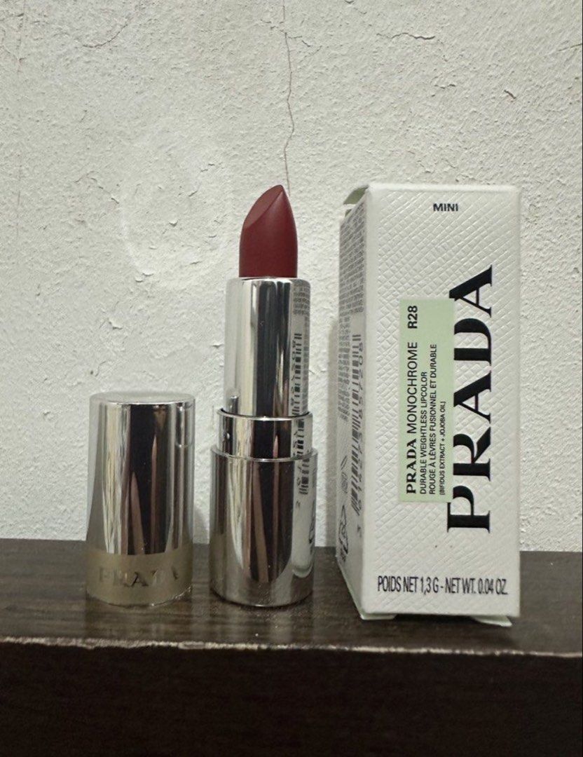 Sold ✨ thank you (Category: Makeup) located in Cebu City. Submitted by shopnsave2015 (Listing ID 1439629106, Image 2). Description: - Prada Monochrome Lipstick in R28 - Deep red color - 1.3g / 0.04 oz size - Silver tube with Prada logo - Includes original box.