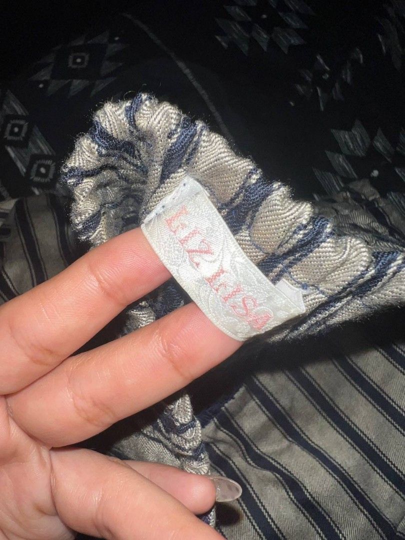 Striped Lace Trim Skirt (Category: Skirts) located in Manila. Submitted by thriftwithlies (Listing ID 1439654526, Image 2). Description: - Striped skirt - Lace trim - Ribbon detail at waist - Dark blue lining - Sturdy material - Label visible in photos.