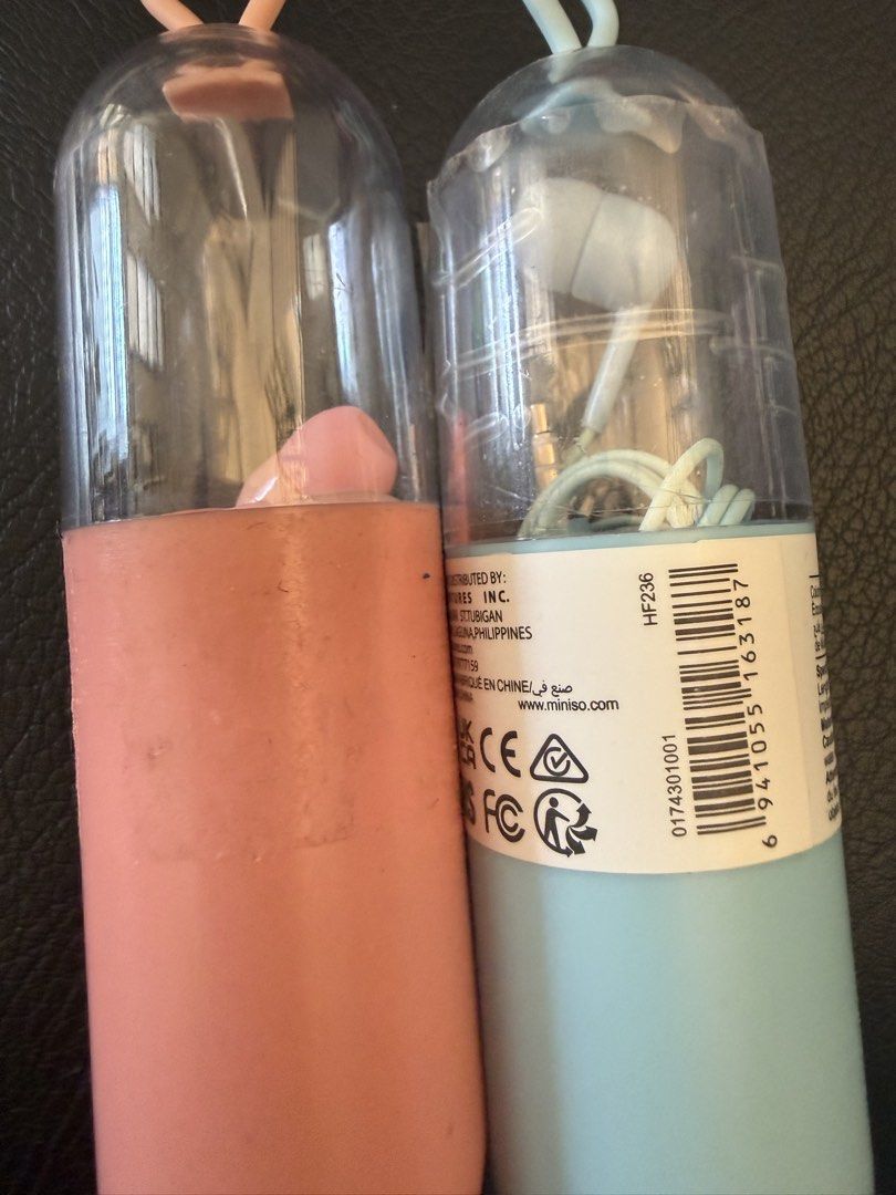 Take All Miniso Earphones (Category: Earphones) located in Bulacan. Submitted by emjay_17 (Listing ID 1439671714, Image 1). Description: - Miniso HF236 earphones - Wired earphones - Comes with a cylindrical case - Case has a loop for easy carrying - Earphones are pink and blue.