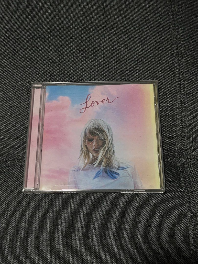 Taylor Swift Lover CD (Category: CDs & DVDs) located in Marikina City. Submitted by d.clutters (Listing ID 1439734333, Image 1). Description: - Slightly Negotiable - Original Taylor Swift 'Lover' CD - Includes the CD and original case - Features hit songs: 'Cruel Summer', 'The Man', 'Lover', and more! - Album art features Taylor Swift.