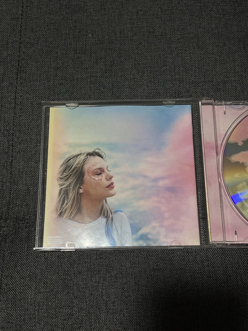 Taylor Swift Lover CD (Category: CDs & DVDs) located in Marikina City. Submitted by d.clutters (Listing ID 1439734333, Image 3). Description: - Slightly Negotiable - Original Taylor Swift 'Lover' CD - Includes the CD and original case - Features hit songs: 'Cruel Summer', 'The Man', 'Lover', and more! - Album art features Taylor Swift.
