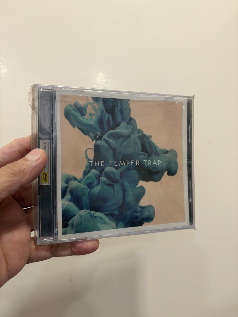The Temper Trap CD - brand new in resealable plastic (Category: CDs & DVDs) located in Pasig City. Submitted by randomhobbiesandcollectibles (Listing ID 1439734172, Image 1). Description: - The Temper Trap CD album - brand new in resealable plastic - Features tracks: "Need Your Love," "London's Burning," "Dreams," and more .