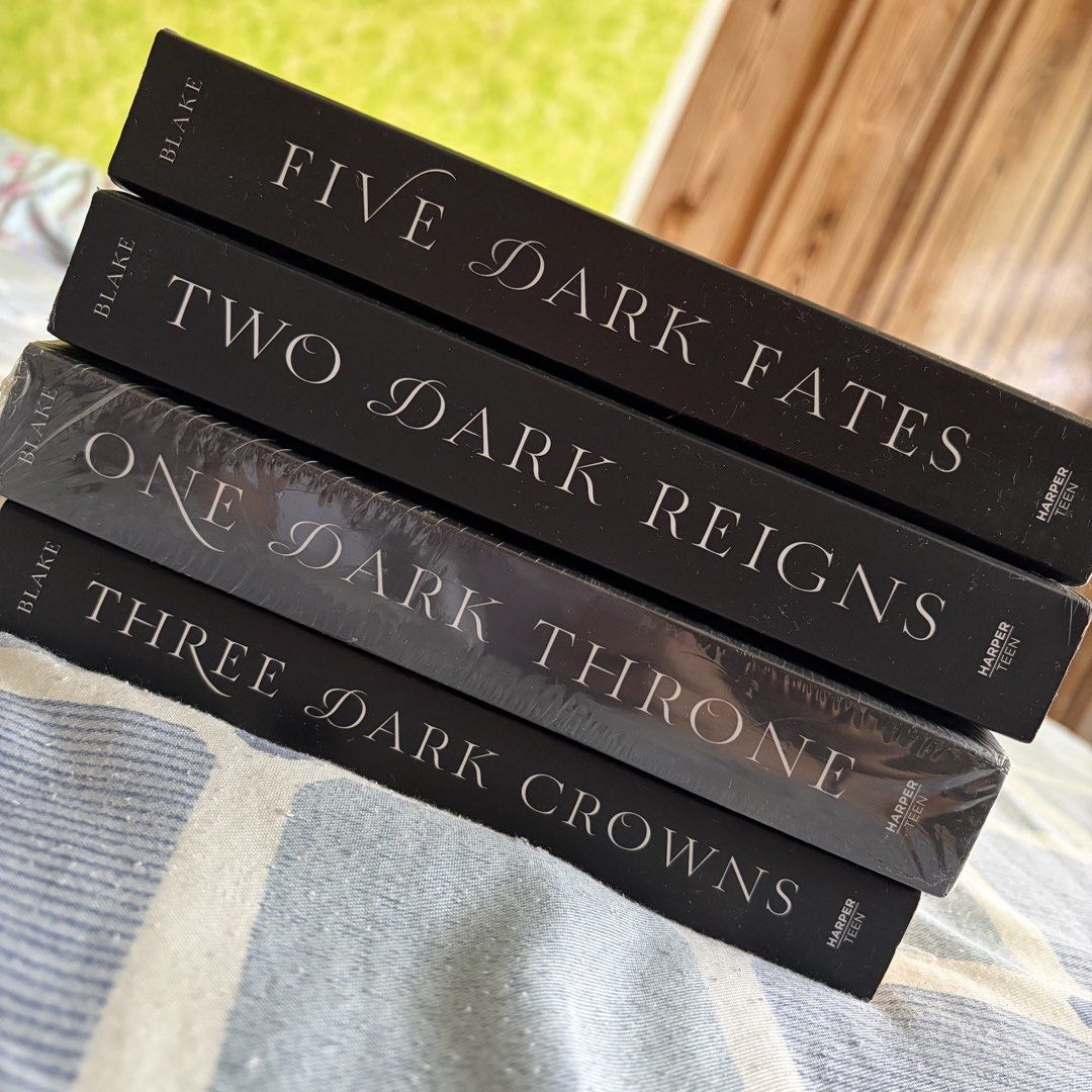 [SET] Three Dark Crowns Book Series by Kendare Blake (Category: Storybooks) located in Rodriguez. Submitted by qtptutty (Listing ID 1439632088, Image 2). Description: - Complete set of the Three Dark Crowns series by Kendare Blake. - Includes all four books: - "Three Dark Crowns" - "One Dark Throne" (Sealed) - "Two Dark Reigns" - "Five Dark Fates" - sold as set.