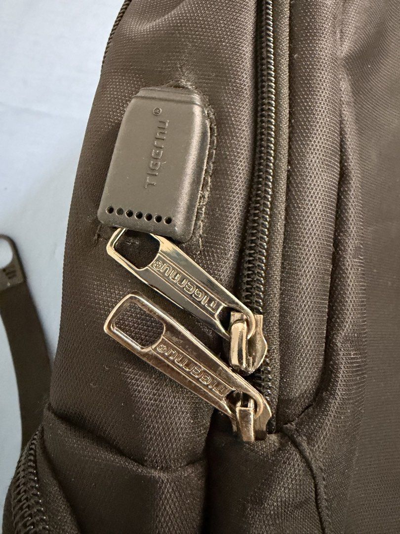 Tigernu Anti-Theft Backpack with TSA Lock (Category: Laptop Bags & Sleeves) located in Tanza. Submitted by calmwind_2a9316 (Listing ID 1439671148, Image 3). Description: - Tigernu Backpack - Built-in TSA Lock for Security - Multiple Compartments for Organization - Breathable Back Panel for Comfort - Durable and Water-Resistant Material - Branded Zippers - With dust bag - USB Charging Port.
