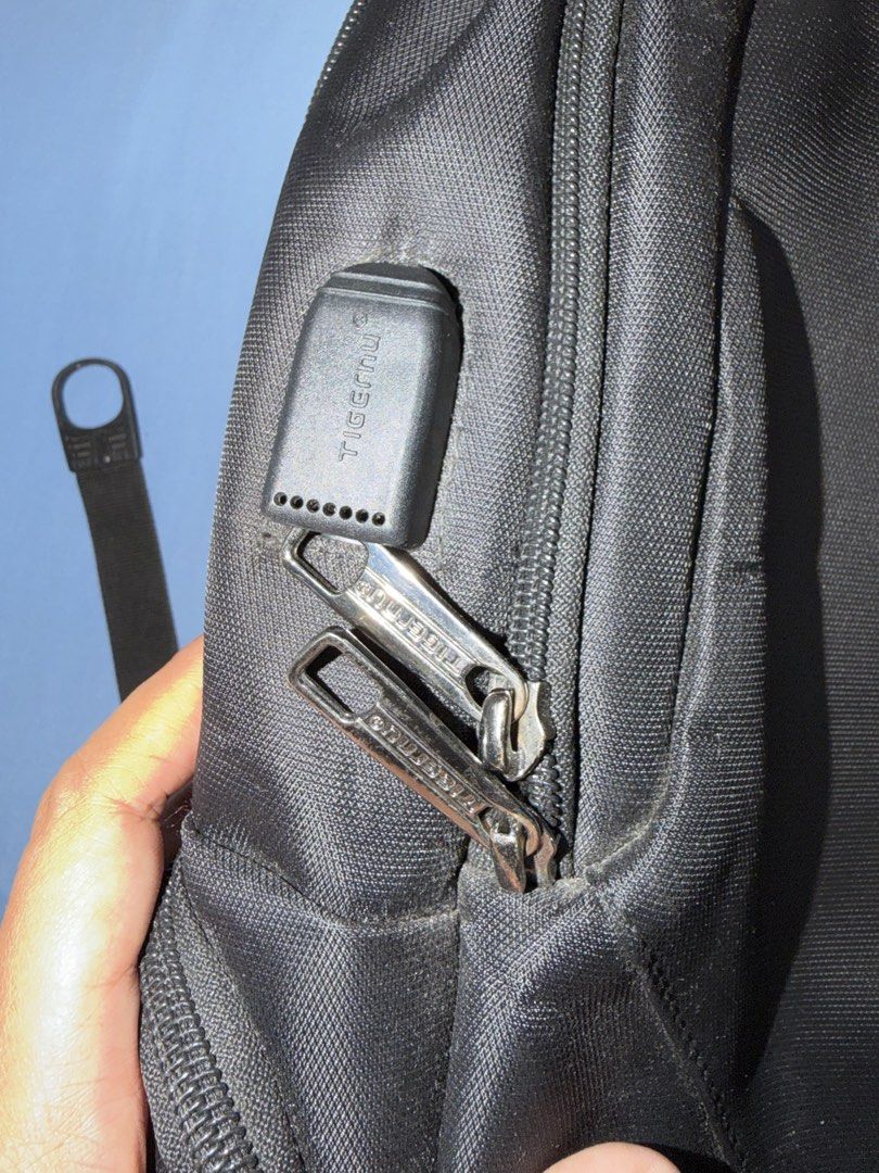 Tigernu Anti-Theft Backpack with TSA Lock (Category: Laptop Bags & Sleeves) located in Tanza. Submitted by calmwind_2a9316 (Listing ID 1439671148, Image 2). Description: - Tigernu Backpack - Built-in TSA Lock for Security - Multiple Compartments for Organization - Breathable Back Panel for Comfort - Durable and Water-Resistant Material - Branded Zippers - With dust bag - USB Charging Port.