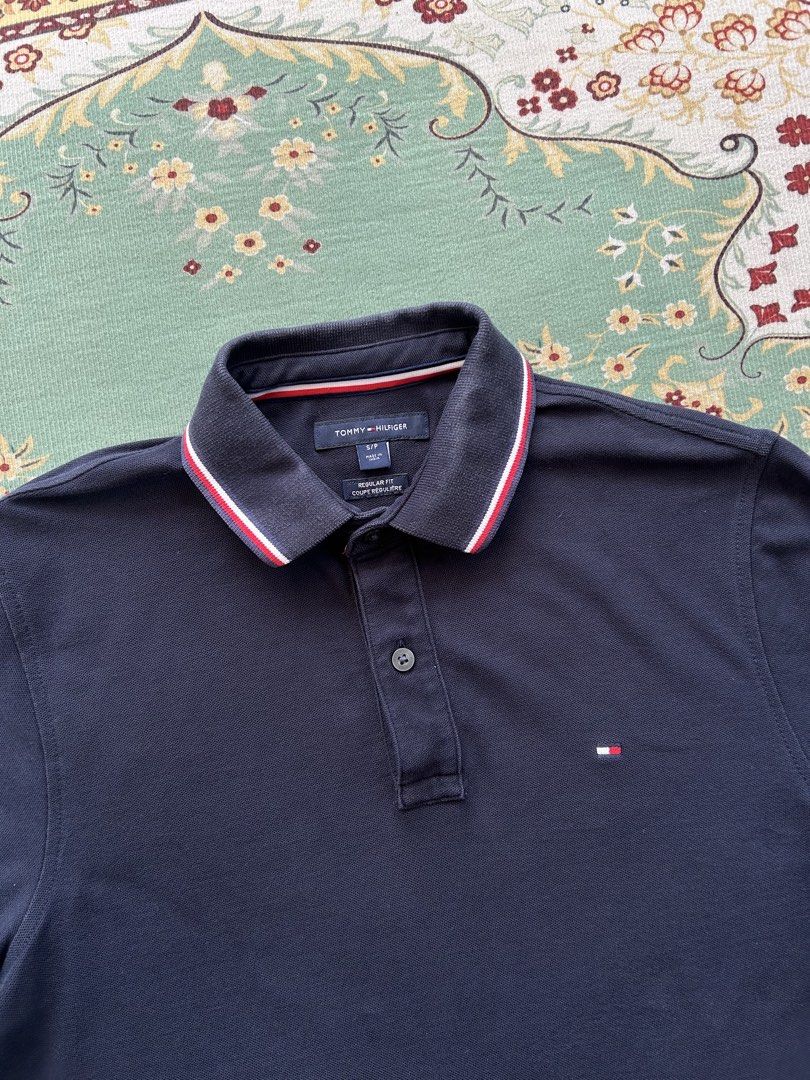 Tommy Hilfiger Polo Shirt (Category: Tshirts & Polo Shirts ) located in Angeles City. Submitted by outboxph (Listing ID 1439706136, Image 2). Description: CODE: NK34 TH Polo Shirt Dark Blue Colorway Authentic/Legit with tag and wash tag Size: Small on tag Dimensions: 26L x 19.5W Sleeve Length: 7.5L Condition: 8/10 discoloration sa collar 450 plus shipping fee.