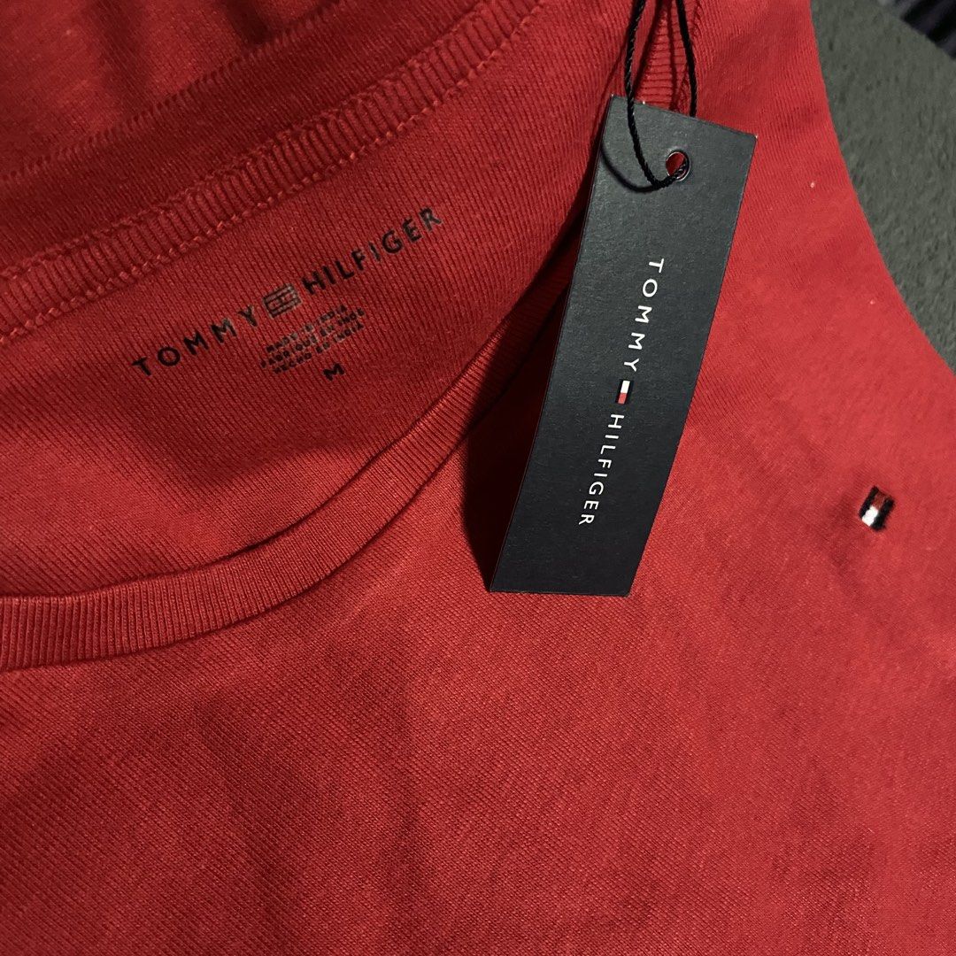 Tommy Hilfiger Red T-shirt (M) (Category: Shirts) located in Cavite. Submitted by canadianfindsph (Listing ID 1439780206, Image 2). Description: ✨ Tommy Hilfiger Shirt ✨ ✔ Size: M ✔ Color: Red ✔ Condition: Brand new from Canada 🇨🇦 Classic and stylish Tommy Hilfiger shirt with a clean, versatile look—perfect for casual wear, office outfits, or layering. Comfortable fit and easy to pair with jeans, trousers, or skirts for an effortlessly polished