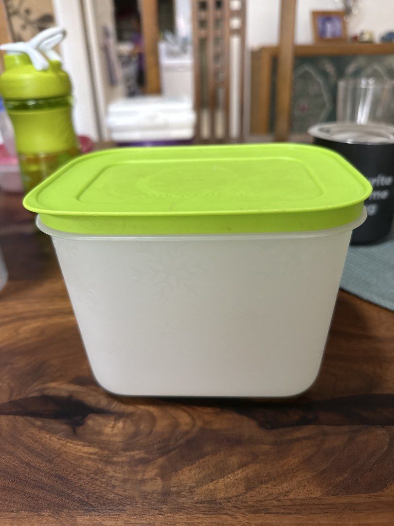 Tupperware Rectangular Food Container (Category: Food Organisation & Storage) located in Singapore. Submitted by anjali1504 (Listing ID 1439607949, Image 2). Description: - Rectangular Tupperware container, freezer safe - Bright green lid - Perfect for storing leftovers - Great for packing lunches - Ready for use.