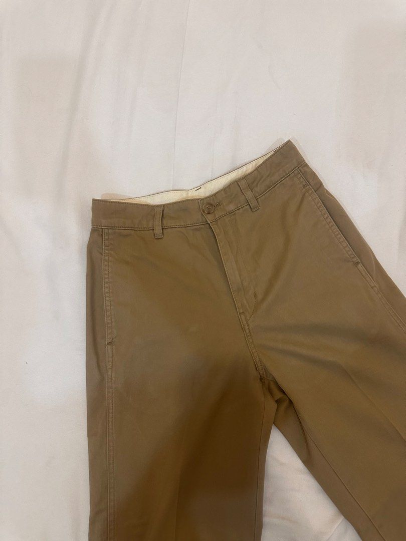 Uniqlo Khaki / Brown Pants (Category: Other Bottoms) located in Quezon City. Submitted by insidecloset.c (Listing ID 1439785403, Image 1). Description: - Uniqlo Khaki/Brown Pants - Wide leg design - Waist: 58cm - Hip: 85cm - Material: 100% Cotton (lining).