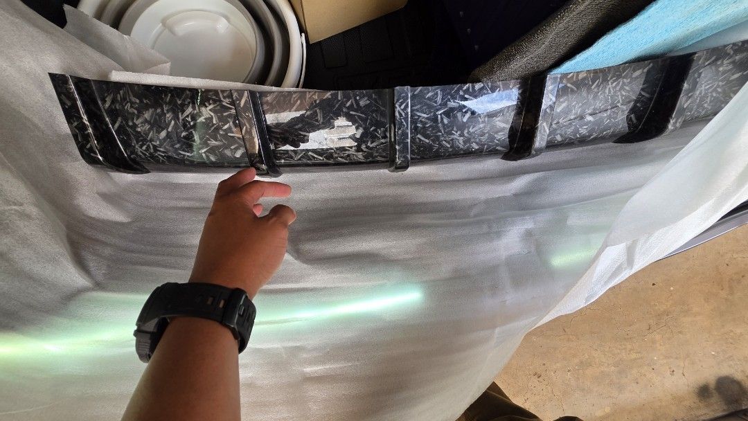 Universal rear diffuser (Category: Bodykits & Styling) located in Singapore. Submitted by magikal747 (Listing ID 1439748236, Image 2). Description: - Universal rear diffuser - Forge carbon dip printed - Condition: 9/10 - Self-collection only - Installation at your own workshop - PM for fast deal.