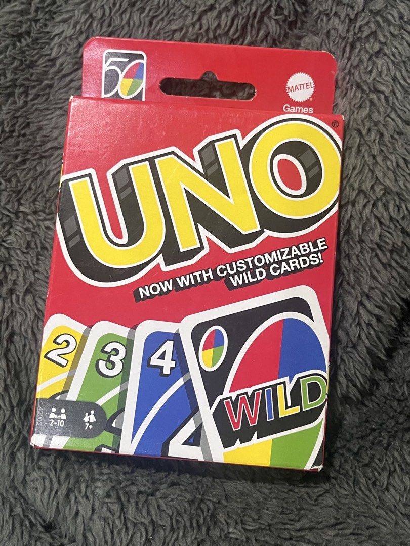UNO Card Game (Category: Board Games & Puzzles) located in Manila. Submitted by ocellus (Listing ID 1439625971, Image 1). Description: - Classic UNO card game - Includes 112 cards and instructions - Features customizable wild cards - For 2-10 players - Ages 7 and up - Easy to learn, fun to play!.