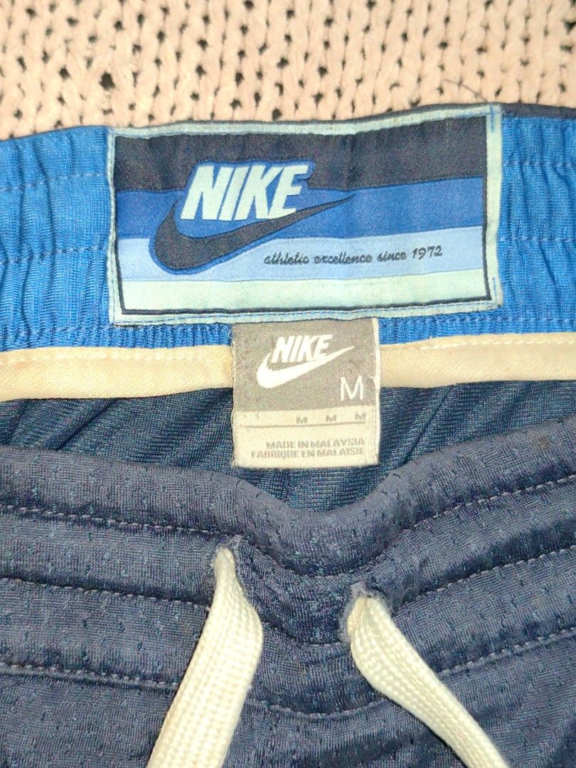 Vintage Nike Blue Active Training Shorts Men (Category: Shorts) located in Tuguegarao City. Submitted by ekko_bag (Listing ID 1439708098, Image 3). Description: Item Specifics: Condition - In very good condition. Thrifted from US Bale ✔️✔✔ - Jersey Shorts - Polyester Nylon - Large Drawstrings, Nike patch logo - Silver Tag, Blue Label - Stretched out elastic waistband - No pinhole, signs of usage,need wash ✔️✔✔ Dimension in inches L x W - 20 x 20 