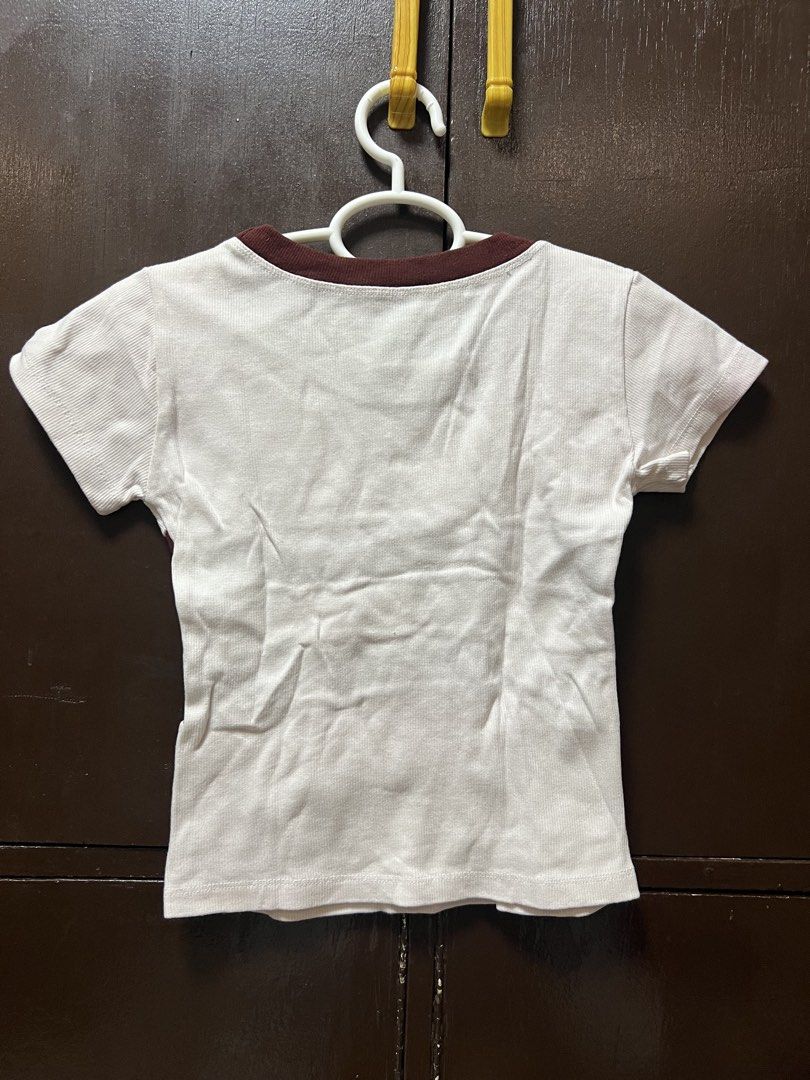White and Maroon Striped T-shirt (Category: Tshirts & Polo Shirts ) located in Manila. Submitted by rainedelatorre14 (Listing ID 1439726733, Image 2). Description: - White t-shirt with brown stripes - Short sleeves - Round neckline - Plain white maroon - Casual style - Suitable for everyday wear.