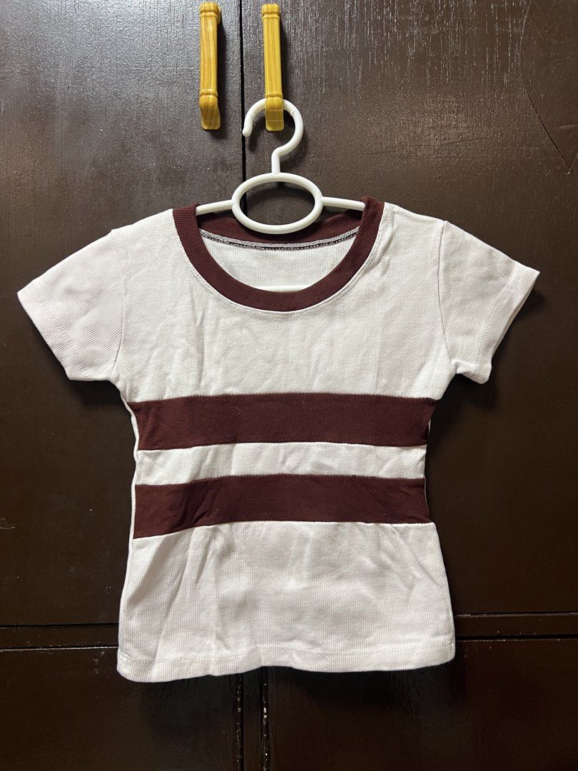White and Maroon Striped T-shirt (Category: Tshirts & Polo Shirts ) located in Manila. Submitted by rainedelatorre14 (Listing ID 1439726733, Image 1). Description: - White t-shirt with brown stripes - Short sleeves - Round neckline - Plain white maroon - Casual style - Suitable for everyday wear.