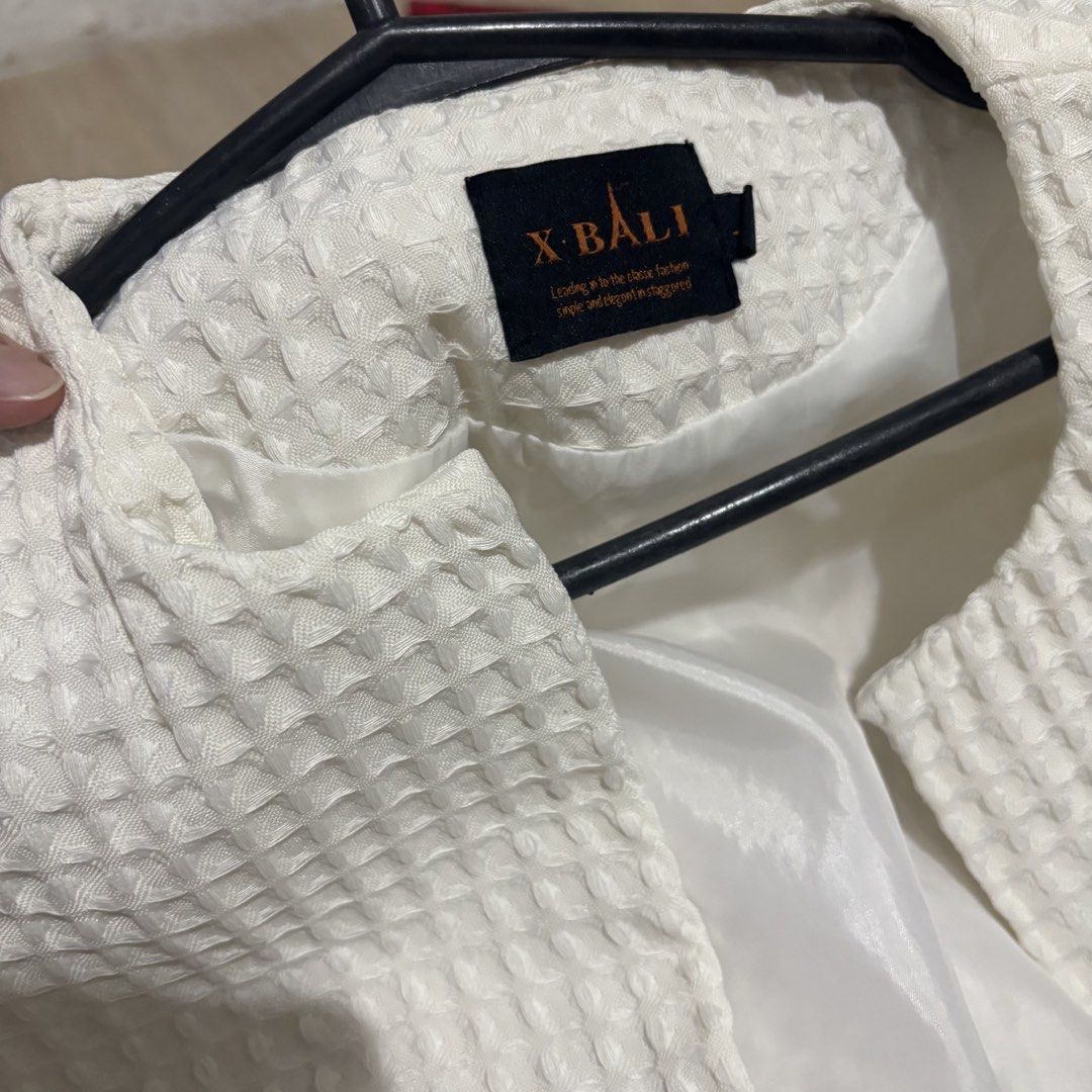 X-Bali White Blazer with Bell Sleeves (Category: Coats, Jackets and Outerwear) located in Las Pinas. Submitted by active.momma07 (Listing ID 1439614733, Image 2). Description: - X-Bali white blazer - Unique textured fabric - Stylish bell sleeves - Open front design - Smooth lining - Versatile for various occasions.