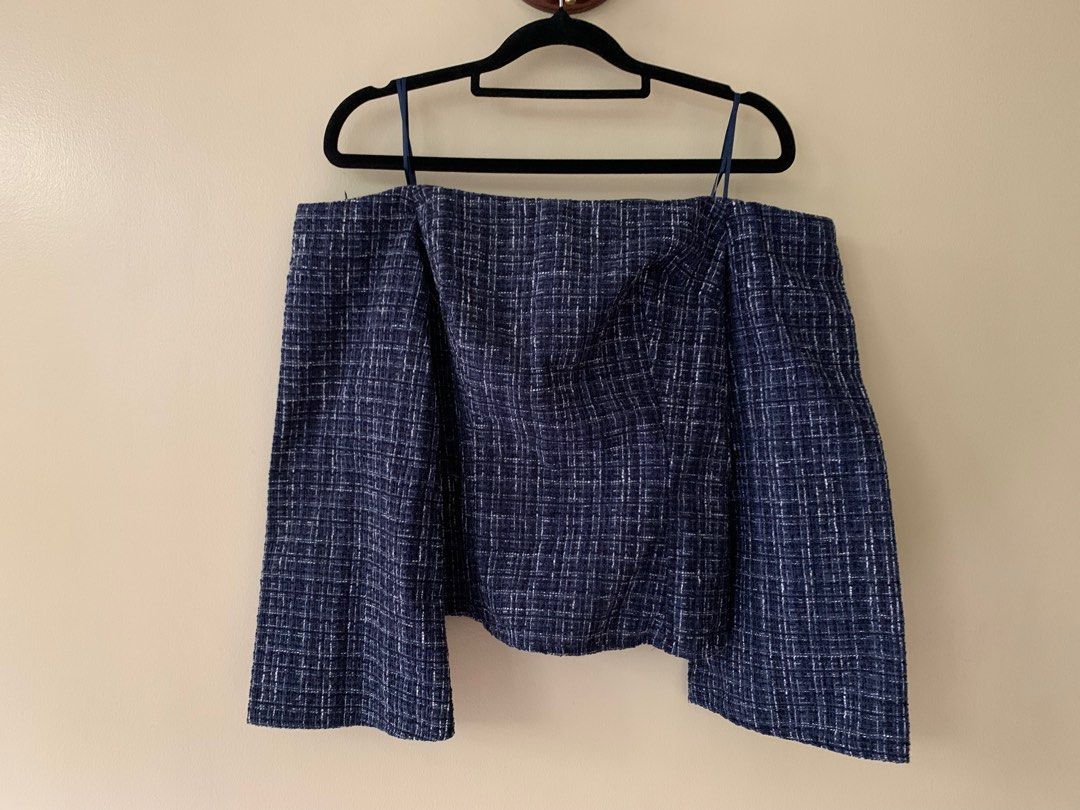 Zara Tweed Off-shoulder top (Brand New) (Category: Blouses) located in Marikina City. Submitted by projectsparkjoy (Listing ID 1439676259, Image 2). Description: Zara Off-Shoulder (Brand New with tag) Size: XS Color: Navy Blue with off white and black Material: Tweed ✨Has a silicone anti-slip on the chest and shoulder area to prevent from slipping down. ✨Side-zipper ✨Bell-shaped 3/4 sleeves.