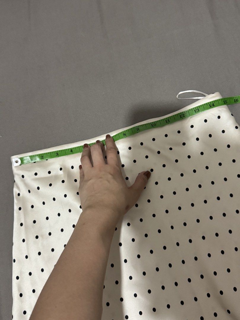 Zara Polka Dot Asymmetrical Skirt (Category: Skirts) located in Cavite. Submitted by ellieschoice (Listing ID 1439667257, Image 2). Description: • Asymmetrical hemline • Waist: 14.5" laid flat , fits 26/27 if worn low waist • Length: 20" on one side, 30" on the longer side • Silky fabric.