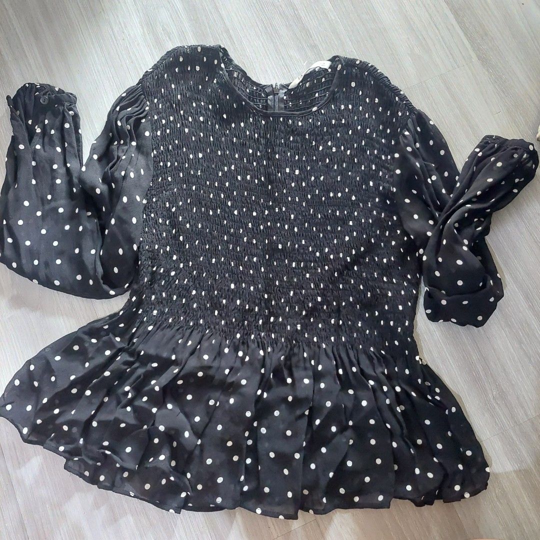 Zara Polka Dot Blouse - Size M (Category: Blouses) located in Governor Generoso. Submitted by cma_rarefitph (Listing ID 1439613796, Image 2). Description: - Zara black blouse with white polka dots - Size: M - Features: Long sleeves, shirred bodice, round neckline, flared hem - Material: Lightweight - Made in Turkey.