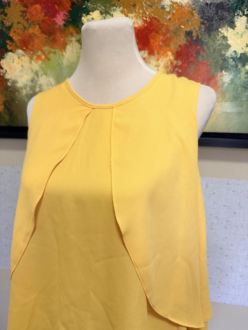ZARA sleeveless blouse (Category: Sleeveless) located in Muntinlupa City. Submitted by gap0710 (Listing ID 1439622041, Image 3). Description: Zara sleeveless yellow blouse. Perfect for office and casual wear. In excellent condition. .