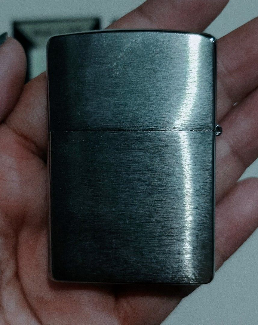 Zippo Lighter - Curve (29913) (Category: Vintage Collectibles) located in Caloocan City. Submitted by jessygeronimo (Listing ID 1439764701, Image 3). Description: - Authentic Zippo lighter - Made in the USA - Unique curved design - Silver finish with wave pattern - Includes original box.