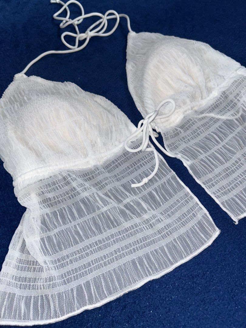 3XL WHITE CRINKLE MESH HALTER TOP (Category: Sleeveless) located in Manila. Submitted by declutter_lala (Listing ID 1439950034, Image 2). Description: !!!PLEASE READ!!! White Crinkle Mesh Ruffle Halter Top ✨ Crinkle mesh overlay fabric ✨ Triangle NOT PADDED bust area with halter adjustable tie ✨ Perfect for summer outings, beach trips, cottagecore, or y2k fairy aesthetics 3XL For only ₱150.
