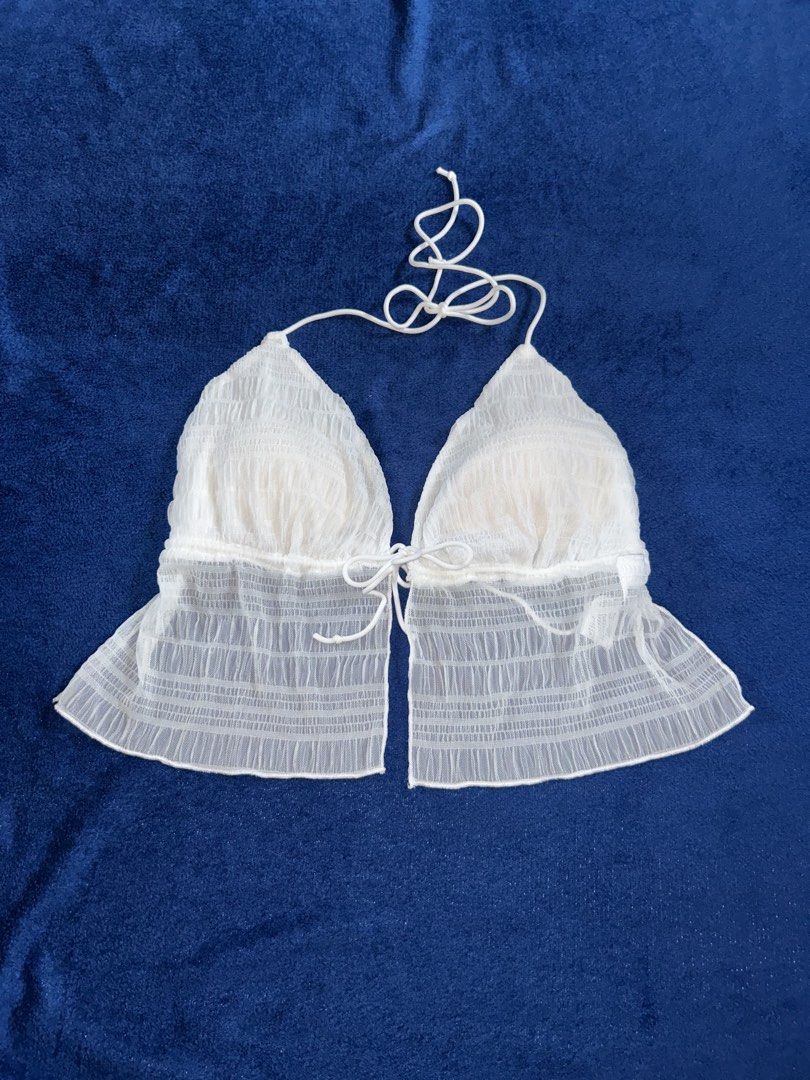 3XL WHITE CRINKLE MESH HALTER TOP (Category: Sleeveless) located in Manila. Submitted by declutter_lala (Listing ID 1439950034, Image 1). Description: !!!PLEASE READ!!! White Crinkle Mesh Ruffle Halter Top ✨ Crinkle mesh overlay fabric ✨ Triangle NOT PADDED bust area with halter adjustable tie ✨ Perfect for summer outings, beach trips, cottagecore, or y2k fairy aesthetics 3XL For only ₱150.