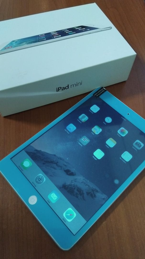 (Category: iPad) located in Singapore. Submitted by houstan_22 (Listing ID 1439895231, Image 3). Description: The Apple iPad Model A1432 is the original iPad mini (1st Generation) - Apple iPad Mini, iOS 9.3.5 - In original box, Including charger and cable - Screen protector still on (Beautiful light blue).