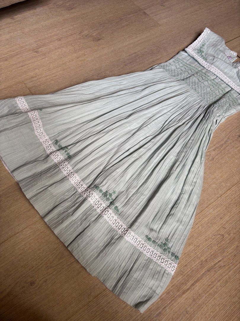 Smocked Green Dress Size 8 (Category: Babies & Kids Fashion) located in Cebu City. Submitted by limjennif52235 (Listing ID 1439824144, Image 3). Description: - Ana Rosa green dress - Intricate embroidery and lace detailing - Pleated skirt - Fitted bodice - Round neckline, sleeveless - Size 8 - Perfect for special occasions or everyday wear.