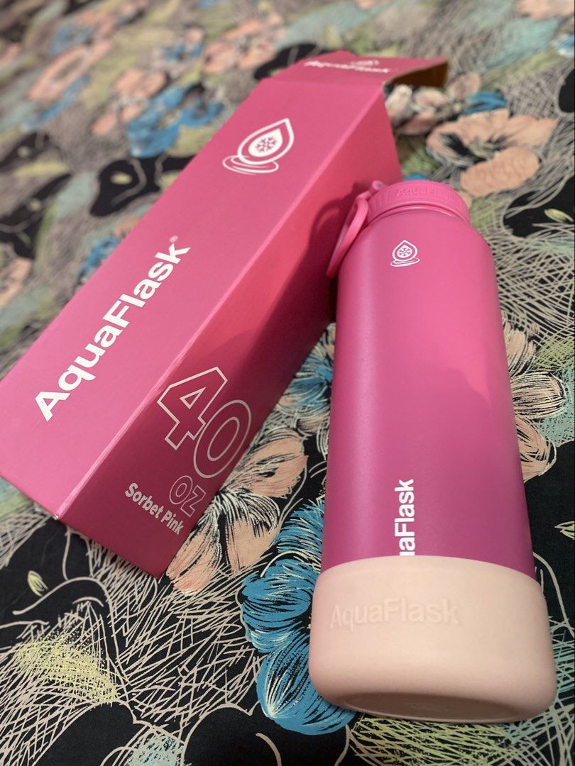 AquaFlask 40oz Sorbet Pink Insulated Water Bottle with Free Boot (Category: Water Bottles & Tumblers) located in Tarlac. Submitted by reezie_finds (Listing ID 1439962796, Image 1). Description: 📍Tarlac City Shipping fee shoulder by the Buyer :) - Includes original box and lid. -Free light pink boot..