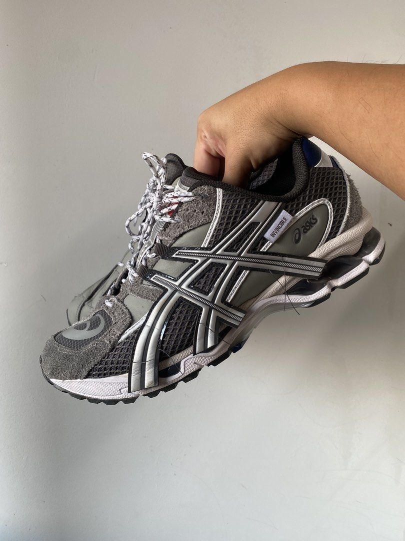 ASICS Gel-Nimbus 12 x Invincible (Category: Sneakers) located in Singapore. Submitted by findthegap (Listing ID 1439927774, Image 2). Description: - ASICS Gel-Nimbus 12 x Invincible collaboration - Colour: Grey and white with red and blue accents - Ideal for collectors or stylish, comfortable trainers - US10 Without box. Can pass you replacement box .
