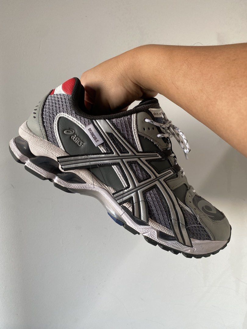 ASICS Gel-Nimbus 12 x Invincible (Category: Sneakers) located in Singapore. Submitted by findthegap (Listing ID 1439927774, Image 3). Description: - ASICS Gel-Nimbus 12 x Invincible collaboration - Colour: Grey and white with red and blue accents - Ideal for collectors or stylish, comfortable trainers - US10 Without box. Can pass you replacement box .