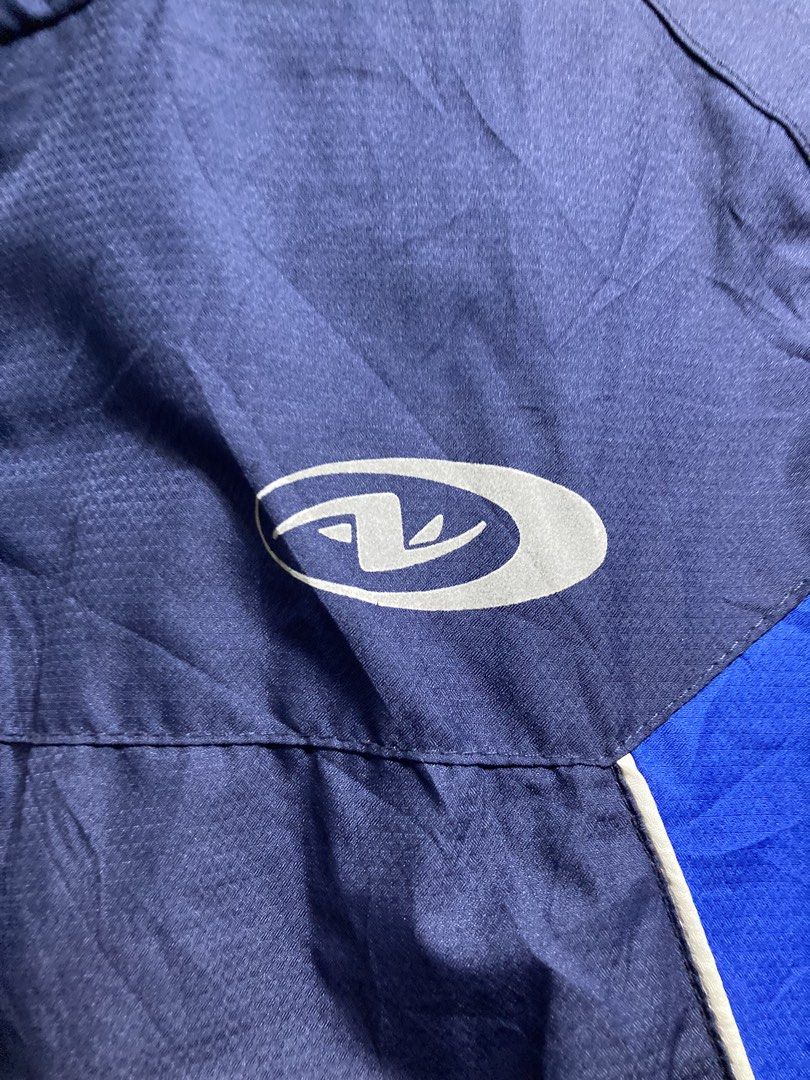 Athletic Works Men's Navy Blue Track Jacket (Category: Coats, Jackets and Outerwear) located in Iloilo. Submitted by __kyleeee__ (Listing ID 1439916500, Image 2). Description: - Athletic Works track jacket - Classic navy blue and royal blue color block design with white accents - Full zip front - Stand-up collar - Perfect for workouts or casual wear.