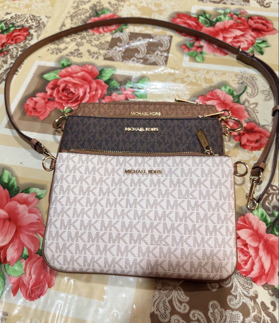 Authentic MK triple pouch sling (Category: Luxury Bags & Wallets) located in Mandaluyong City. Submitted by mariascloset_ph (Listing ID 1439850186, Image 1). Description: Seldom used. Mint condition.