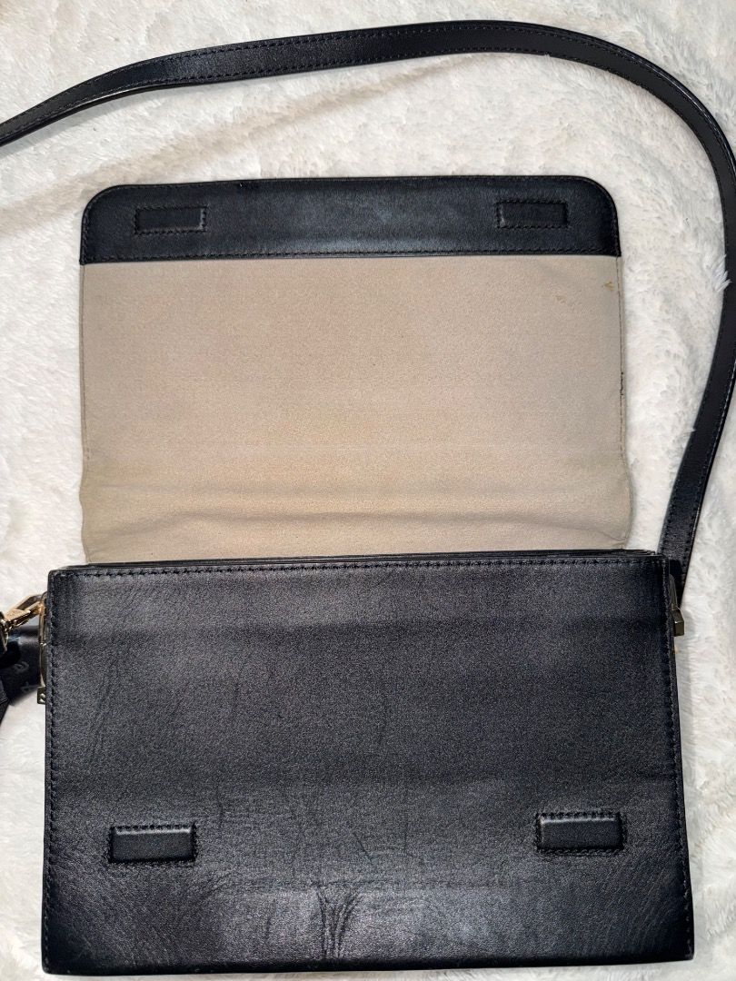 AUTHENTIC orYANY Black Leather Flap Crossbody Bag (Category: Cross-body Bags) located in Caloocan City. Submitted by luxury_revival_co_0525 (Listing ID 1439969431, Image 2). Description: Premium Korean brand, genuine smooth leather Good used condition with minor signs of use (no major flaws!) Minimalist style, timeless black & gold combo.
