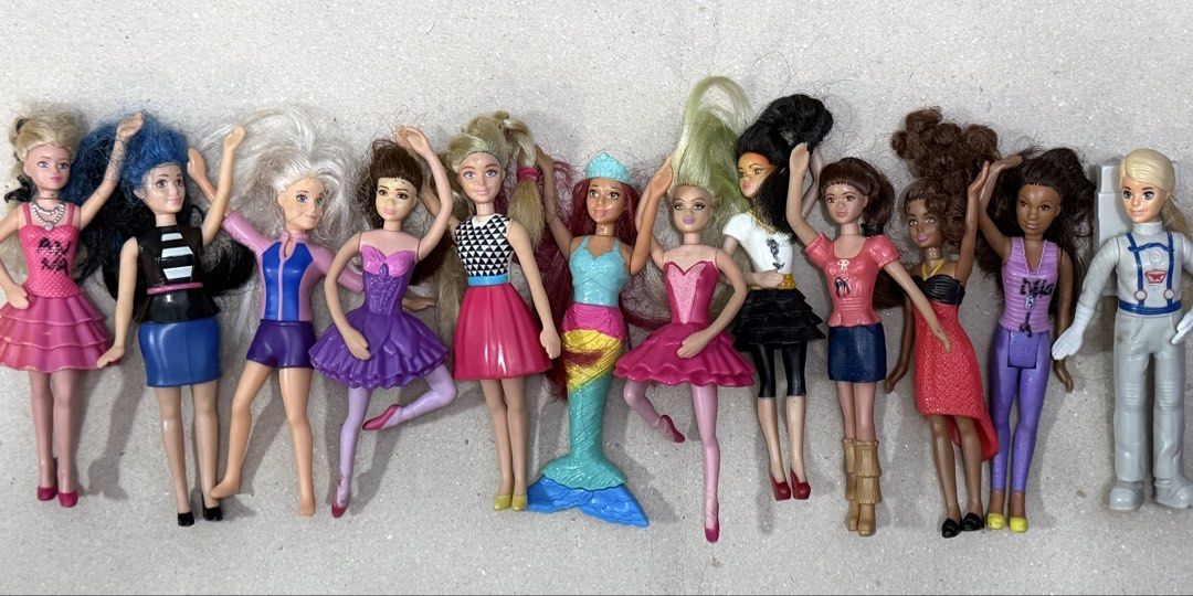 Barbie Figures 2019 Happy Meal Set (Category: Kids Toys) located in Quezon City. Submitted by kingjj04 (Listing ID 1439816218, Image 2). Description: - Barbie miniature doll set - Various outfits and styles - Dolls are from the 2019 Mcdonalds Happy meal - Added Wonderwoman figure, same sizewith the Barbies - Includes a pen for size comparison RFS: decluttering.