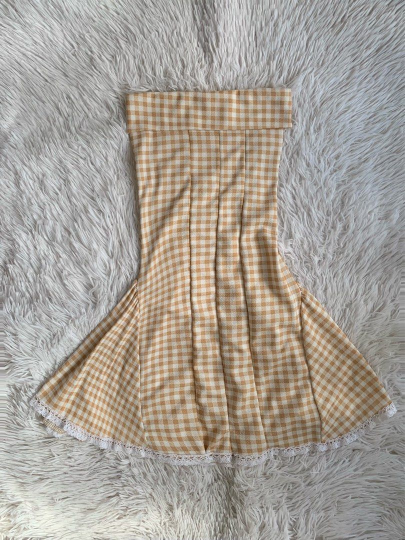 Beige Gingham Tube Dress (Category: Skirts) located in San Carlos. Submitted by findsbymiles (Listing ID 1439896011, Image 1). Description: size: small-medium no issues sf will be shouldered by the buyer mop: gcash | mod: jnt delivery 📍san carlos, pangasinan.