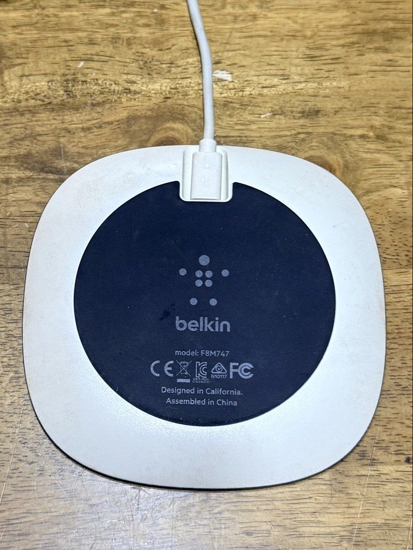 Belkin Qi Wireless Charging Pad (Category: Chargers & Cables) located in Makati City. Submitted by agent_k (Listing ID 1439966581, Image 2). Description: - Belkin Wireless Charger Pad (Model: FBM747) - Color: Black and White - Includes: White USB Cable - Charging Type: Qi-enabled Wireless Charging - Design Origin: California - Perfect for your Qi-compatible devices.