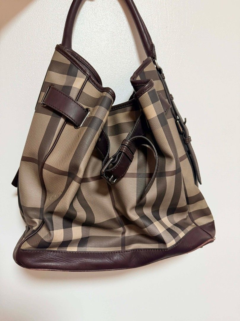 AUTHENTIC BURBERRY WALDEN BELTED HOBO – SMOKED CHECK PLUM (Category: Luxury Bags & Wallets) located in Cavite. Submitted by greysieg (Listing ID 1422792335, Image 1). Description: Vintage Burberry Letting go of my authentic Burberry Walden Belted Hobo in Smoked Check — a beautiful vintage piece featuring the signature pleated detailing, side buckle accents, and classic Burberry smoked-check canvas. This is a high-value vintage model that is becom