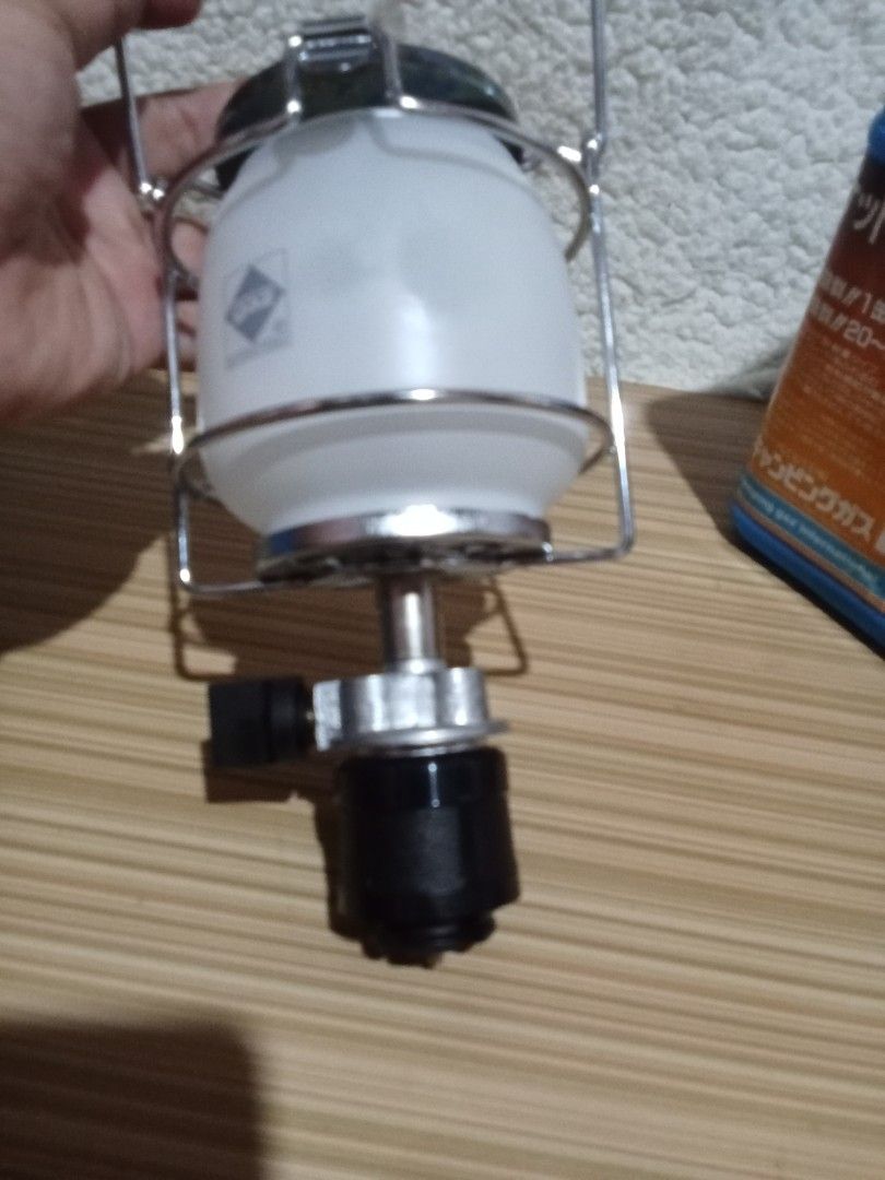 Camping Gaz International Pocket Lamp Lantern (Category: Lighting) located in Bocaue. Submitted by marajapansurplus (Listing ID 1439927300, Image 2). Description: - Selling as it is - Portable camping gaz pocket lamp - Durable metal frame - Frosted glass shade for diffused lighting - Comes with original blue storage case - Ideal for camping, hiking, and emergency use.
