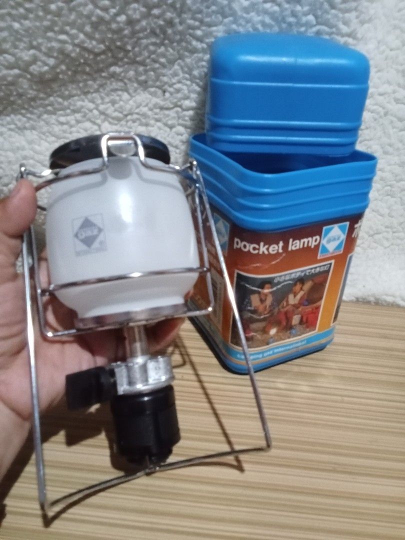 Camping Gaz International Pocket Lamp Lantern (Category: Lighting) located in Bocaue. Submitted by marajapansurplus (Listing ID 1439927300, Image 1). Description: - Selling as it is - Portable camping gaz pocket lamp - Durable metal frame - Frosted glass shade for diffused lighting - Comes with original blue storage case - Ideal for camping, hiking, and emergency use.