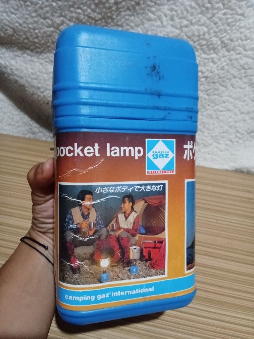 Camping Gaz International Pocket Lamp Lantern (Category: Lighting) located in Bocaue. Submitted by marajapansurplus (Listing ID 1439927300, Image 3). Description: - Selling as it is - Portable camping gaz pocket lamp - Durable metal frame - Frosted glass shade for diffused lighting - Comes with original blue storage case - Ideal for camping, hiking, and emergency use.