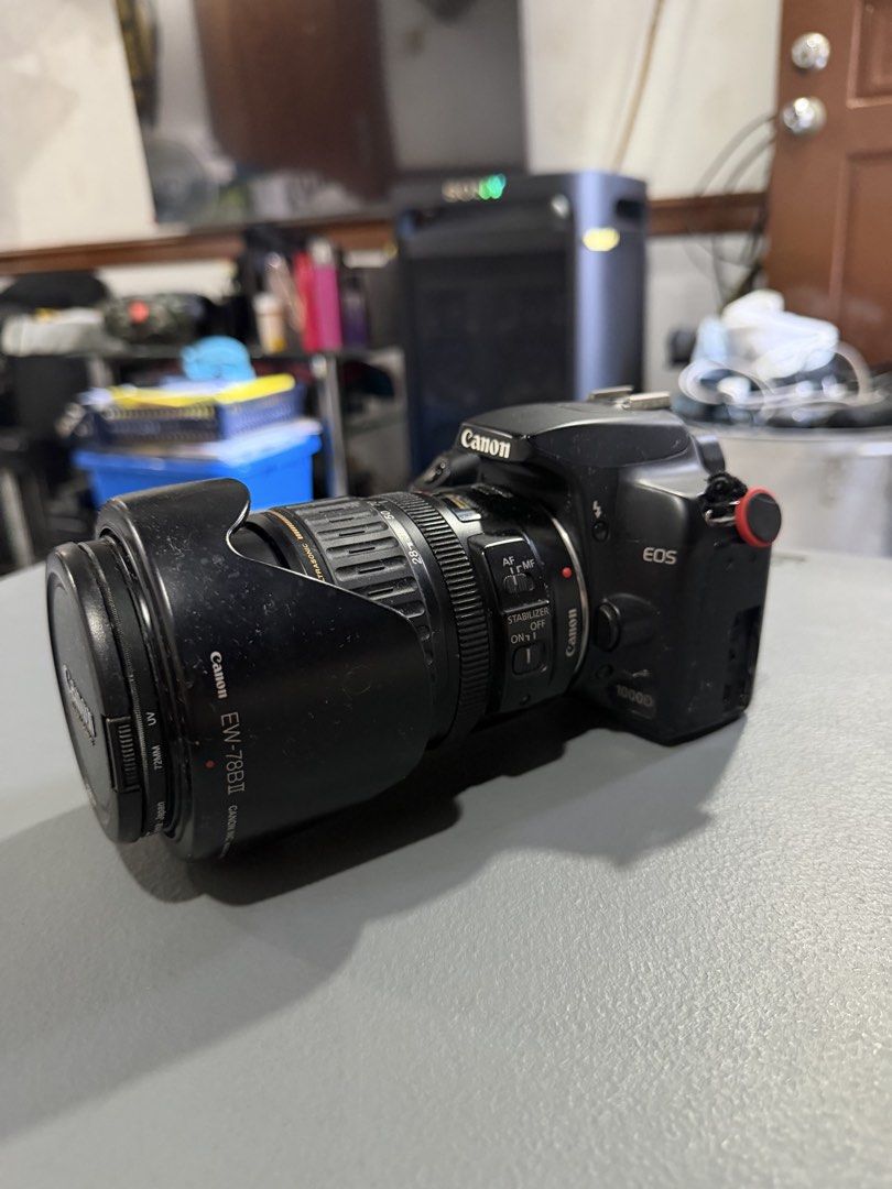Canon EOS Camera with Lenses (Category: Cameras) located in Manila. Submitted by seanjbanz (Listing ID 1439876760, Image 2). Description: CANON EOS 1000D Features: * Max Shutter Speed: 1/4000 sec * ISO: Auto, 100-1600 * Max Resolution: 3888 x 2592 * Screen size: 2.5” * Optical (pentamirror) viewfinder * In very good condition Inclusions: * Original Canon 1000D camera body * 18-55mm Canon lens * EF 28-135mm f/3.5-5.6 Canon lens * EF 50mm f/1.8 Can