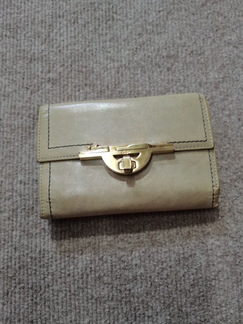 Cartier tri fold wallet (Category: Wallets & Card holders) located in Apalit. Submitted by _doer (Listing ID 1439852949, Image 1). Description: Sign of usage.